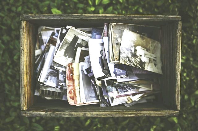 What is Memory; Wooden box with old photographs inside