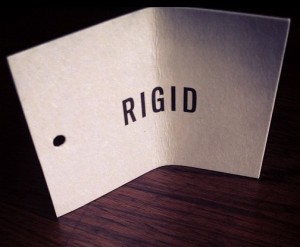 Card with word RIGID Rigidity after brain injury