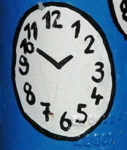 Taskbuster Painted clock on blue background